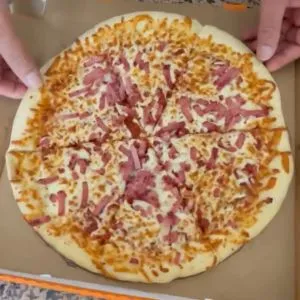 full circular pizza to represent breast