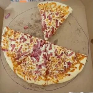 two slices of pizza representing breast removed